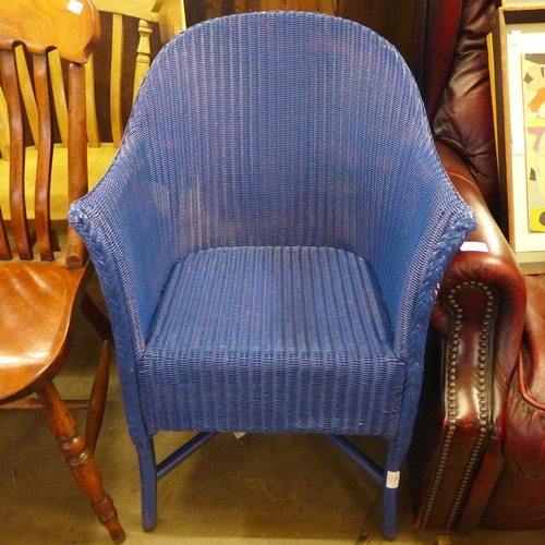 245 - A blue painted Lloyd Loom armchair