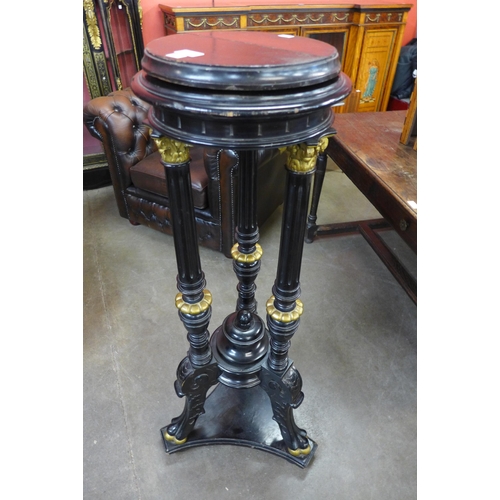 25 - A 19th Century French ebonised and parcel gilt pedestal