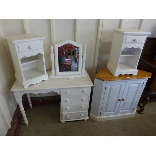 254 - A painted pine dressing table, a pair of pot cupboards and a corner cupboard