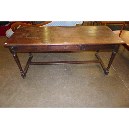 26 - A 17th Century oak single drawer refectory table