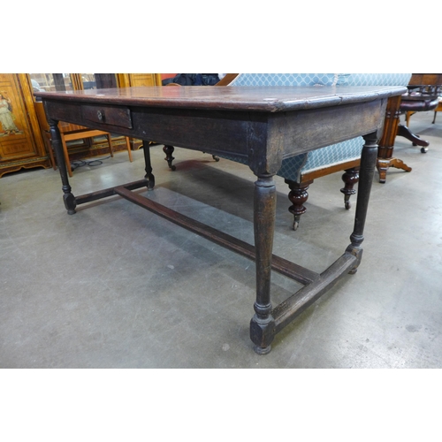 26 - A 17th Century oak single drawer refectory table