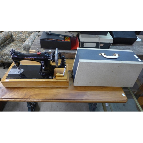 264 - A vintage cased Consul sewing machine