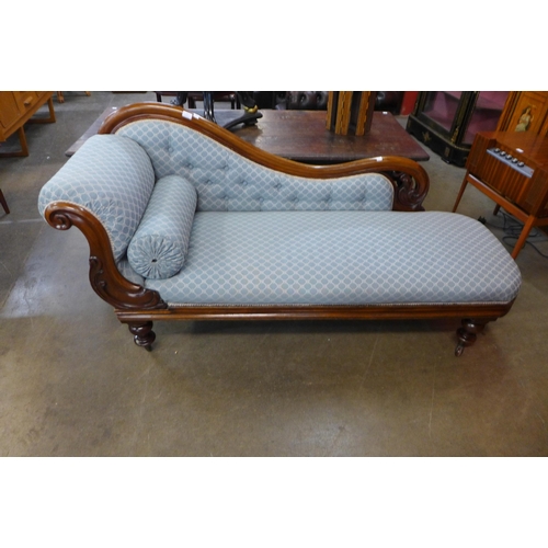 27 - A Victorian mahogany and fabric upholstered chaise longue