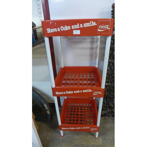 275 - A Coca-Cola bottle stand