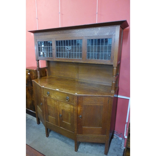 28 - An Arts and Crafts oak sideboard