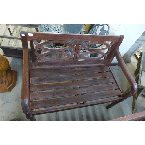 296 - A wooden garden bench