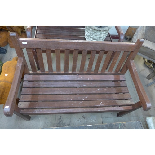 297 - A wooden garden bench