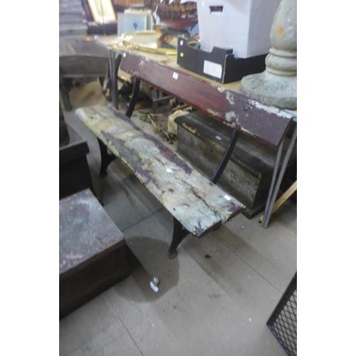 305 - A Victorian pine and cast iron platform bench