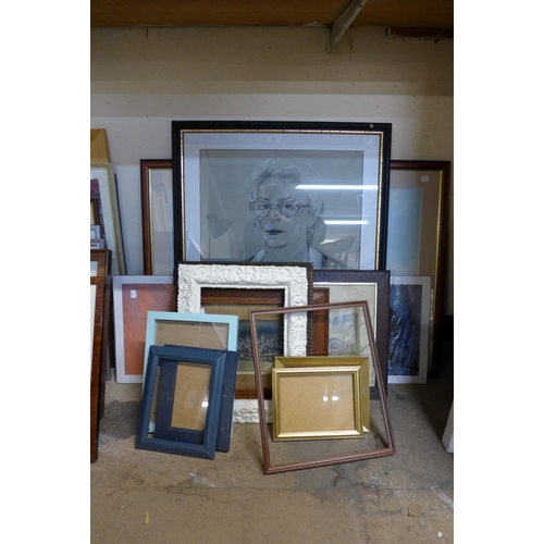 326 - A Montague Dawson marine scene print, a charcoal portrait of a lady, frames, etc.