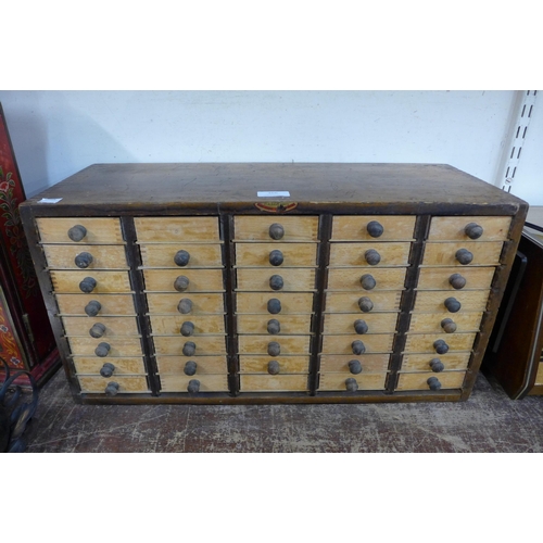 366 - A vintage beech table top chest