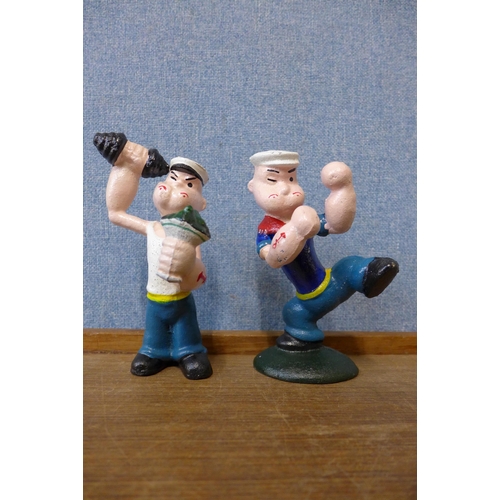 372 - A pair of painted cast iron Popeye figures