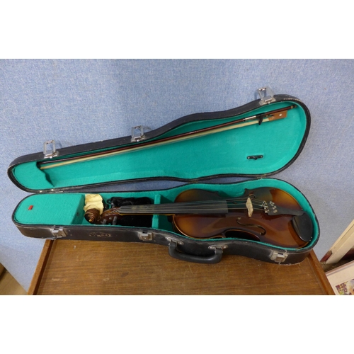 389 - A Czechoslovakian violin and bow, cased