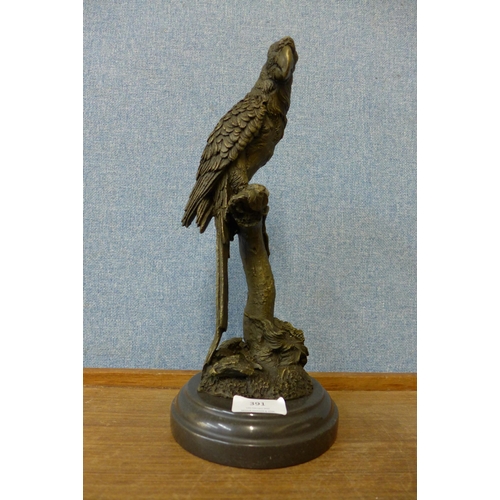 391 - A French style bronze figure of a parrot, on black marble socle