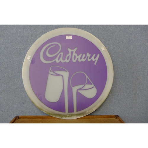 392 - A Perspex Cadburys circular advertising sign