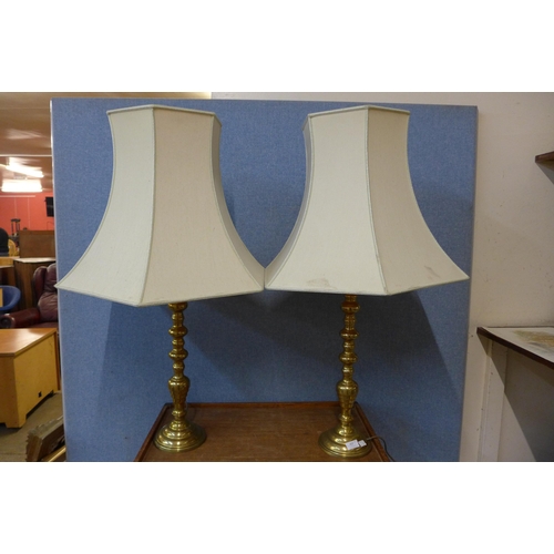 402 - A pair of brass table lamps