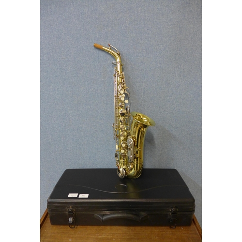 409 - A saxophone, cased