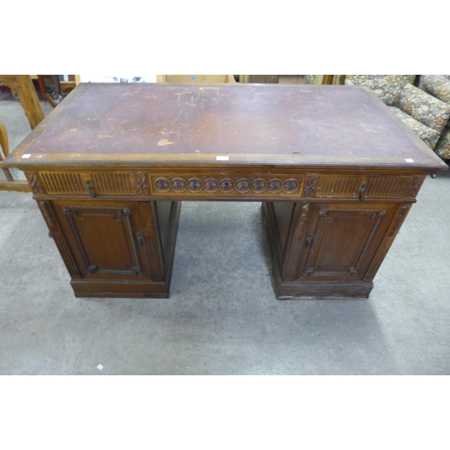 44 - A 19th Century French carved walnut library desk