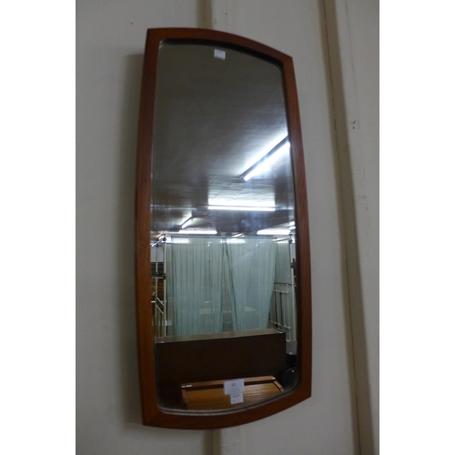 52 - A teak framed mirror