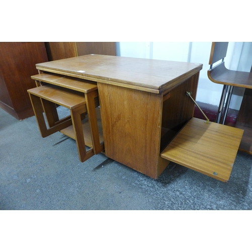 54 - A McIntosh Tristor teak fold over cabinet/table