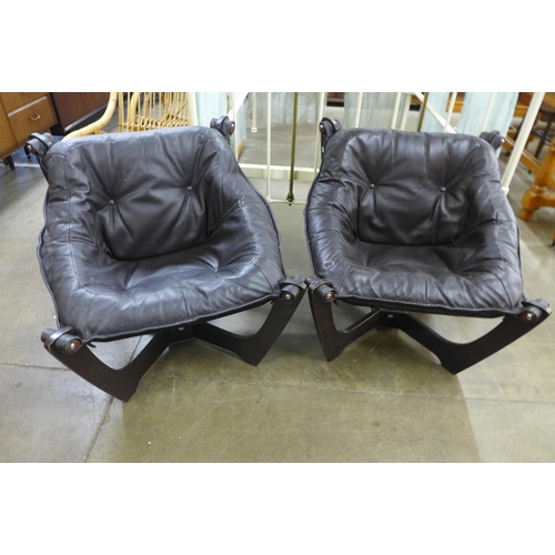 61 - A pair of Odd Knutsen style beech and brown leather Luna chairs