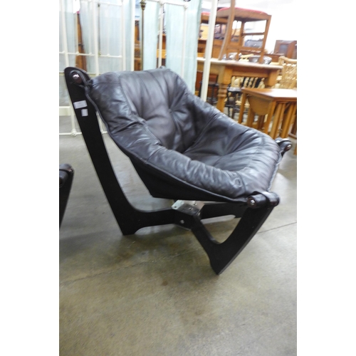 61 - A pair of Odd Knutsen style beech and brown leather Luna chairs