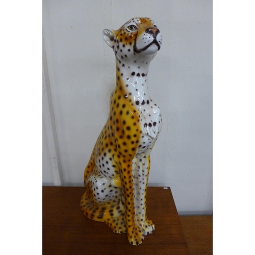 73 - An Italian porcelain figure of a cheetah, 84cms h