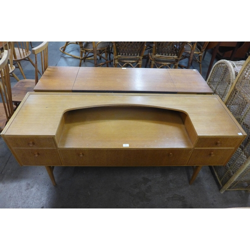 78 - A light oak sideboard