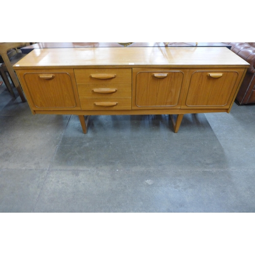 83 - A teak sideboard