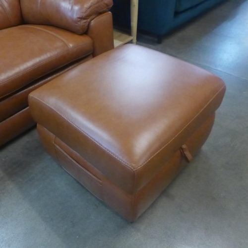 1301 - A designer tan leather three seater sofa and footstool/ottoman