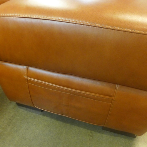 1301 - A designer tan leather three seater sofa and footstool/ottoman