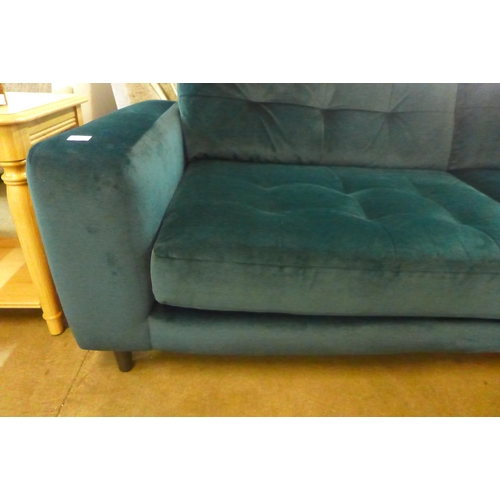 1302 - A designer canopy green three seater sofa (ex-display) - water mark under cushion