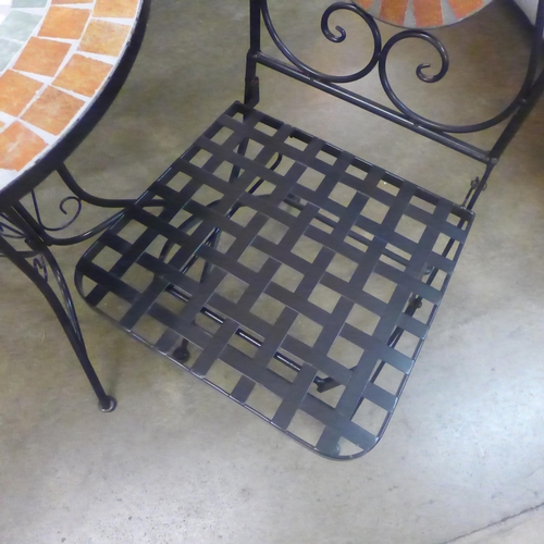 1314 - A three piece black metalwork patio set, with mosaic inlay *This lot is subject to VAT