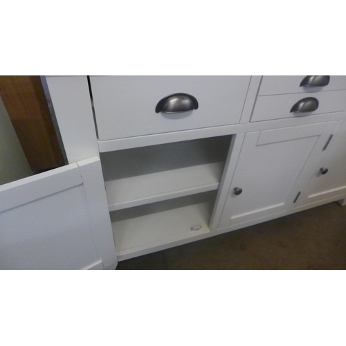 1345 - A white painted and oak three door sideboard * This lot is subject to VAT