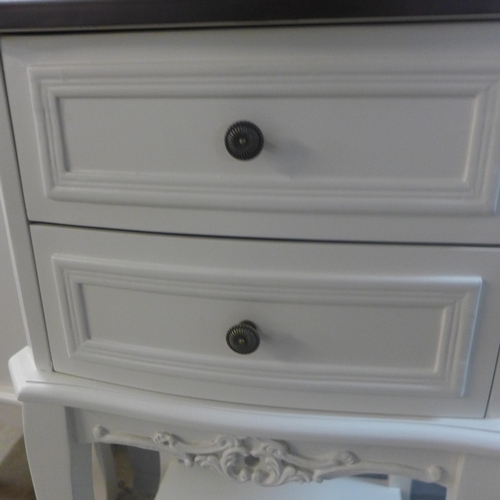 1372 - A white two drawer bedside chest with contrasting top (marked)