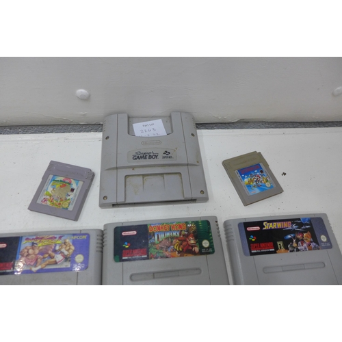 2263 - 3 Super Nintendo consoles, 2 controllers & 12 games