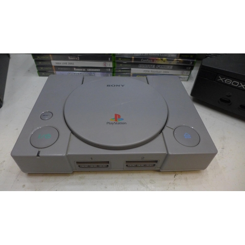 2285 - Playstation 1, XBox, XBox 1 & Nintendo Game Cube consoles, qty. of cables & approx. 12 original game... 