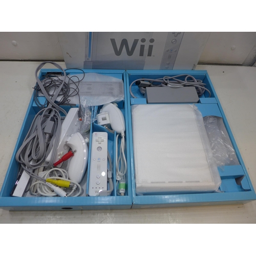 2288 - Wii (First Gen) console in box with 2 controllers, nunchucks and 12 games - W