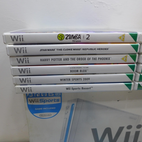 2288 - Wii (First Gen) console in box with 2 controllers, nunchucks and 12 games - W