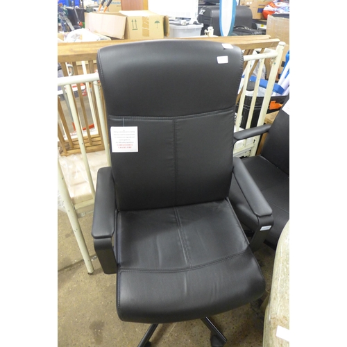 2431 - Two large black vinyl leather look office chairs