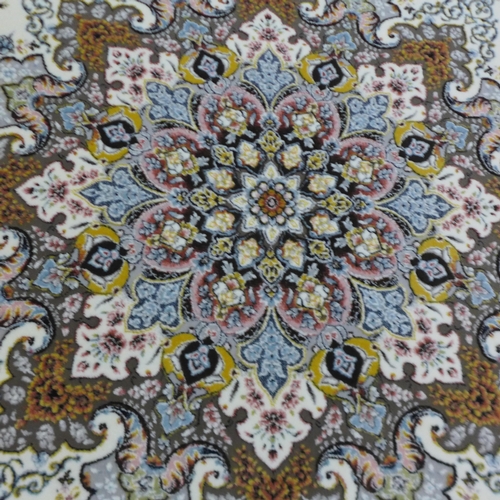 1349 - An ivory ground very fine woven Iranian rug, Svahan medallion design 220 x 150