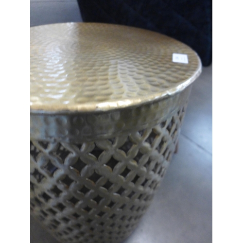 1346 - A gold cylindrical side table * This lot lot is subject to VAT