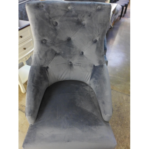 1347 - A designer steel blue button back chair *This lot is subject to VAT