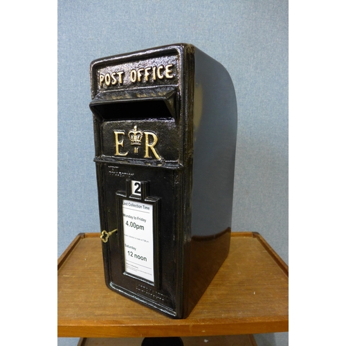 364 - A black metal Post Office letter box, with key