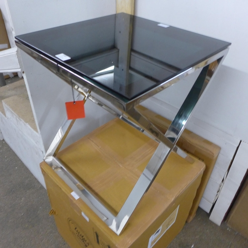 1305 - A black glass top lamp table