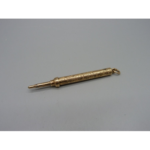 1084 - A yellow metal pencil, mark worn