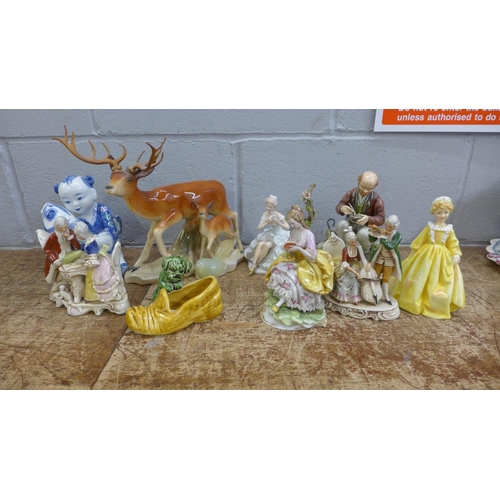 1122 - A collection of porcelain figurines including Royal Worcester and a jade bird, some a/f **PLEASE NOT... 