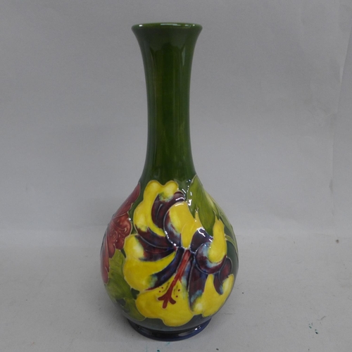 601 - A Moorcroft hibiscus vase, 21.5cm