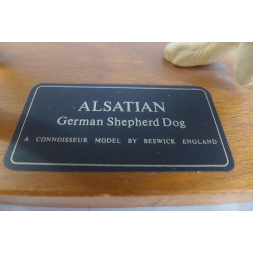 602 - Two Beswick dogs, a Connoisseur model Alsatian German Shepherd and a Golden Retriever