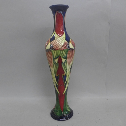 609 - A Moorcroft vase in the Trinity design, 2003, designed by Philip Gibson, numbered 424, 32cm, boxed