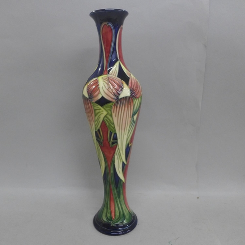 609 - A Moorcroft vase in the Trinity design, 2003, designed by Philip Gibson, numbered 424, 32cm, boxed